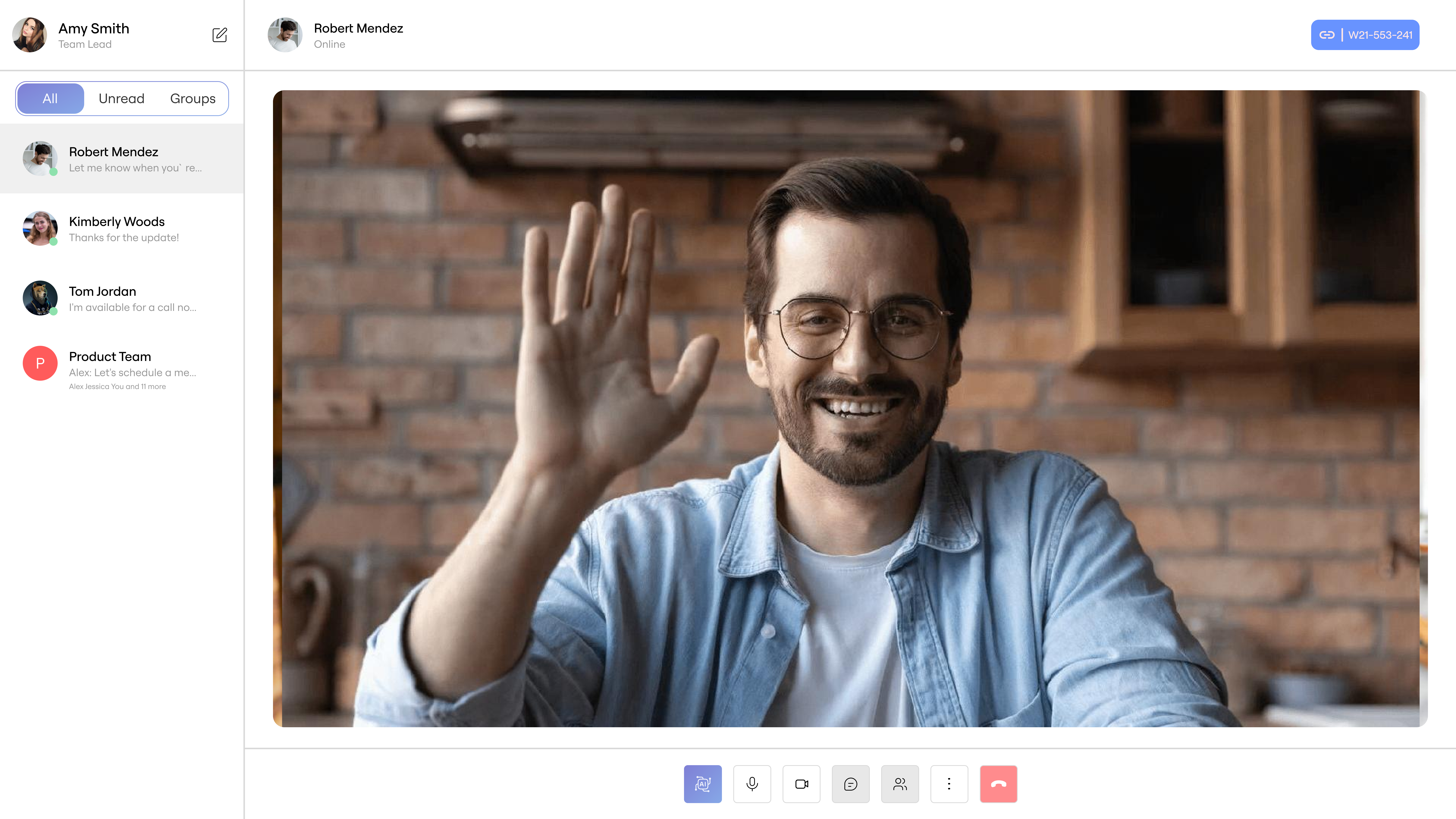 Image of a man waving hello during a video call